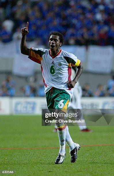 Captain Aliou Cisse of Senegal celebrates the 1-0 victory over France during the second half of the France v Senegal Group A, World Cup Group Stage...