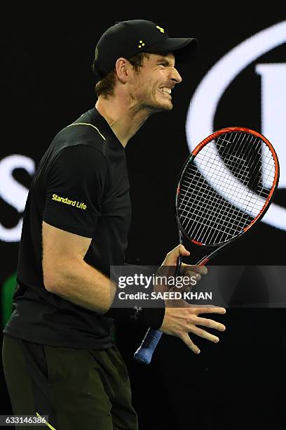 Britain's Andy Murray reacts after a point against Russia's Andrey Rublev during their men's singles match on day three of the Australian Open tennis...