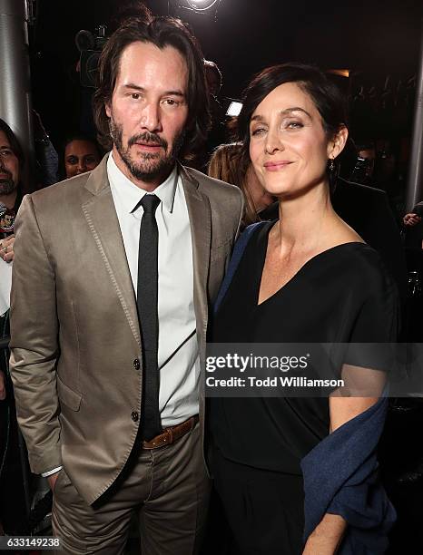 Carrie-Anne Moss and Keanu Reeves attend the Premiere Of Summit Entertainment's "John Wick: Chapter Two at ArcLight Hollywood on January 30, 2017 in...