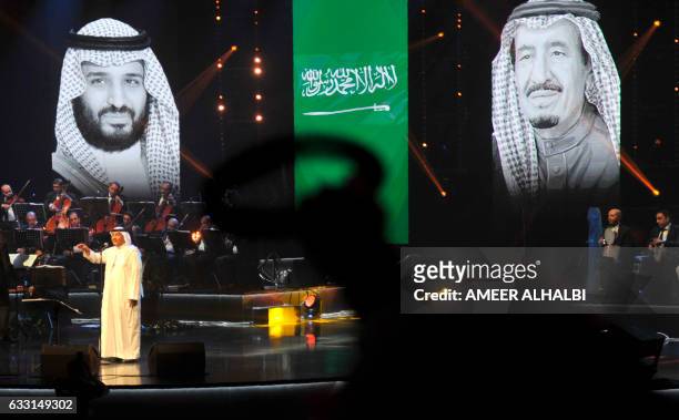 Saudi singer Mohammed Abdu performs during a concert in Jeddah on January 30, 2017. Saudi Arabia's "Paul McCartney" took to the stage as the kingdom...