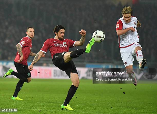 Stefan Strandberg of Hannover is challenged by Daniel Halfar of Kaiserslautern during the Second Bundesliga match between Hannover 96 and 1. FC...