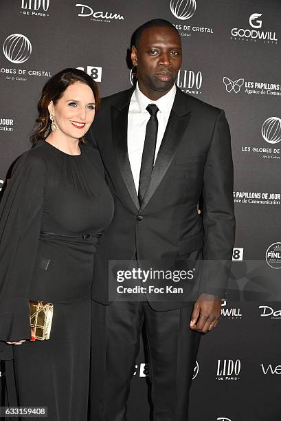 Helene Sy and Globes de Cristal awarded actor Omar Sy attend Les Globes de Cristal Awards 11th Ceremony at Lido on January 30, 2017 in Paris, France.