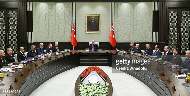 Turkish President Recep Tayyip Erdogan chairs a meeting of National Security Council where Turkish Prime Minister Binali Yildirim and other MGK...