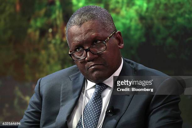 Aliko Dangote, billionaire and chief executive officer of Dangote Group, reacts during a panel session at the World Economic Forum in Davos,...