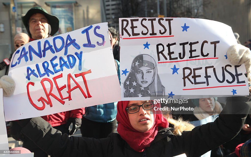 Canadians protest President Trump's travel ban outside of the U.S. Consulate
