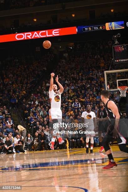 Stephen Curry of the Golden State Warriors shoots a half court shot during the game against the Los Angeles Clippers on January 28, 2017 at oracle...