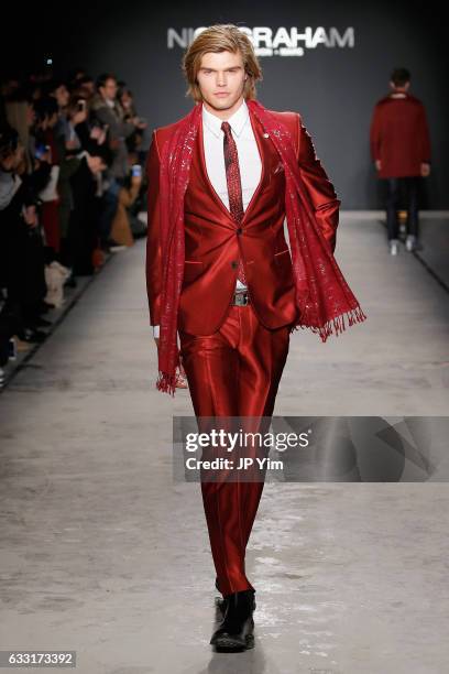 Model walks the runway at the Nick Graham NYFW Men's F/W '17 show on January 31, 2017 in New York City.