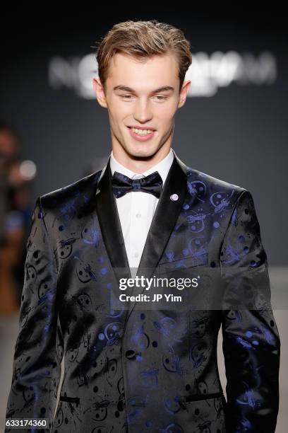 Model walks the runway at the Nick Graham NYFW Men's F/W '17 show on January 31, 2017 in New York City.