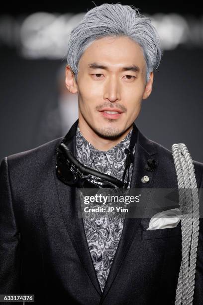 Model walks the runway at the Nick Graham NYFW Men's F/W '17 show on January 31, 2017 in New York City.