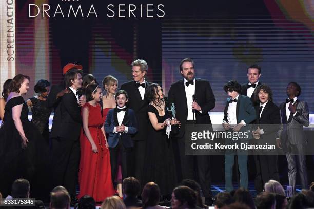The cast of Stranger Things accepts the award for Best Ensemble in a Drama Series onstage during the 23rd Annual Screen Actors Guild Awards at The...