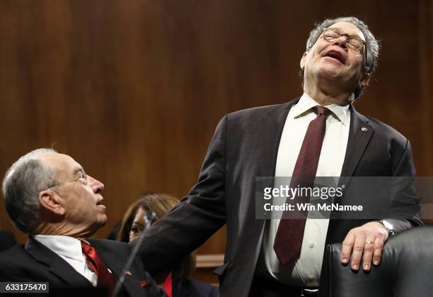 Sen. Al Franken jokes with Committee Chairman Sen. Chuck Grassley prior to the start of the Senate Judiciary Committee's 'markup' on the nomination...