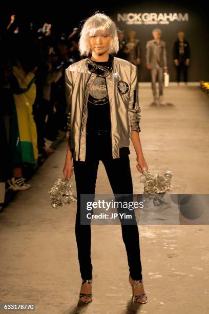 Model walks the runway at the Nick Graham NYFW Men's F/W '17 show on January 31, 2017 in New York City.