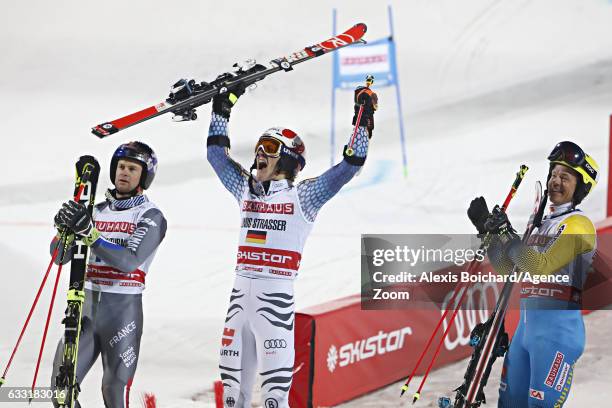 Alexis Pinturault of France takes 2nd place, Linus Strasser of Germany takes 1st place, Mattias Hargin of Sweden takes 3rd place during the Audi FIS...