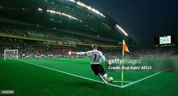 David Beckham of England celebrates after his corner led to the first goal during the England v Sweden, Group F, World Cup Group Stage match played...