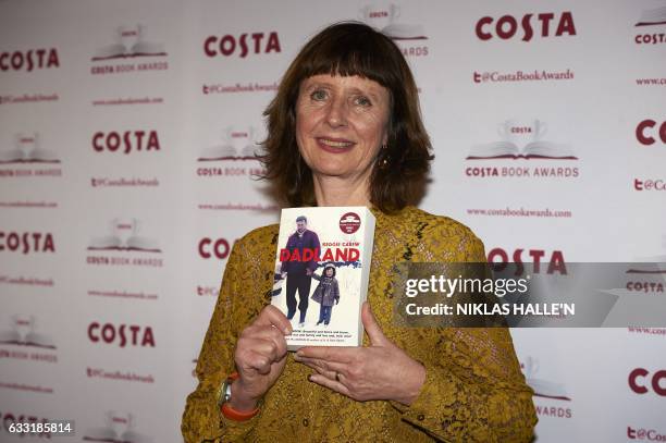 British author Keggie Carew poses with her Biography Award winning book 'Dadland' as she arrives for the 2016 Costa Book Awards in London on January...