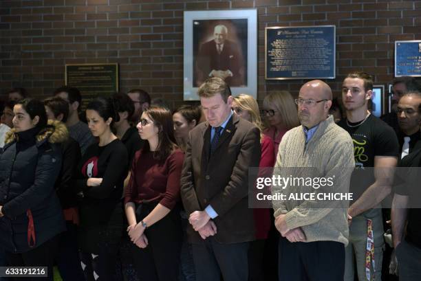 Moment of silence is observed by staff and students in honor of Professor Khaled Belkacemi, one of the six shooting victims on the campus of Laval...
