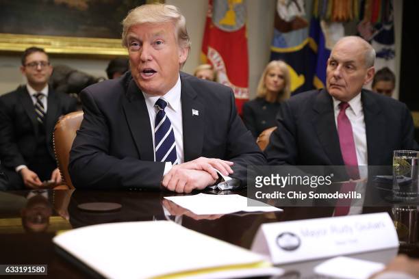 President Donald Trump delivers remarks at the beginning of a meeting with Homeland Security Secretary John Kelly and other government cyber security...