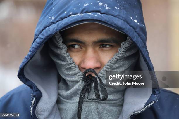 Recently-arrived Honduran immigrant waits for work at a day labor pickup site on January 31, 2017 in Stamford, Connecticut. The city of Stamford has...