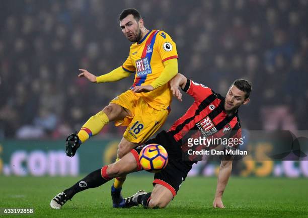 James McArthur of Crystal Palace is tackled by Simon Francis of AFC Bournemouth during the Premier League match between AFC Bournemouth and Crystal...