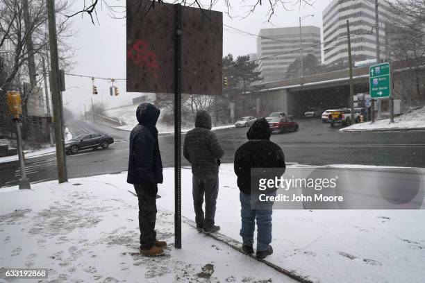 Immigrants wait for work at a day labor pick-up site on January 31, 2017 in Stamford, Connecticut. The city of Stamford has an official zone for...