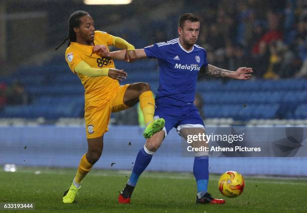 Joe Ralls of Cardiff City is challenged by Daniel Johnson of Preston North End during the Sky Bet Championship match between Cardiff City and Preston...