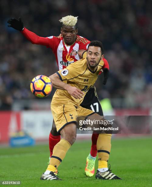 Mousa Dembele of Tottenham Hotspur controls the ball under pressure of Dider Ndong of Sunderland during the Premier League match between Sunderland...