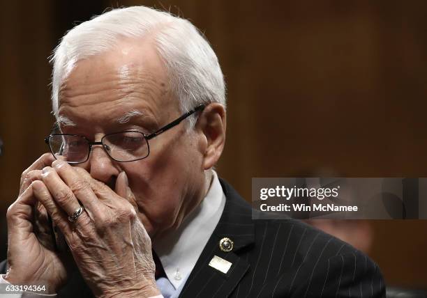 Sen. Orrin Hatch talks on his cell phone during a break in the Senate Judiciary Committee's 'markup' on the nomination of Sen. Jeff Sessions to be...