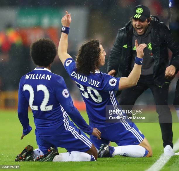 David Luiz of Chelsea celebrates scoring the opening goal with his team mate Willian and manager Antonio Conte during the Premier League match...