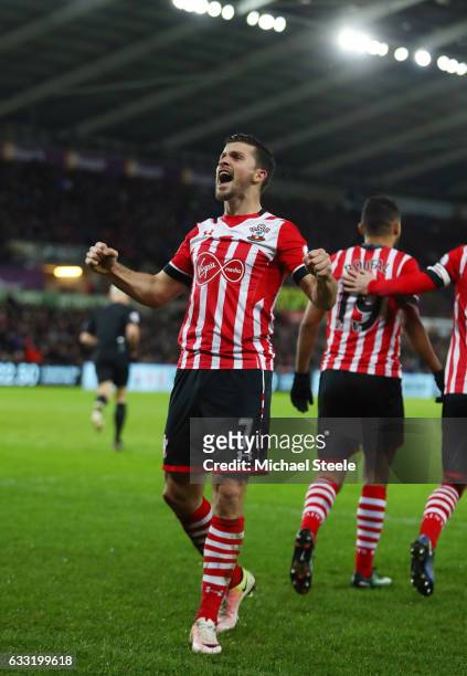 Shane Long of Southampton celebrates scoring his side's first goal during the Premier League match between Swansea City and Southampton at Liberty...