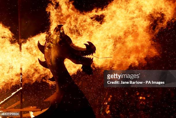 Members of the Jarl Squad set fire to their Viking longship during the Up Helly Aa Viking festival in Lerwick on the Shetland Isles.