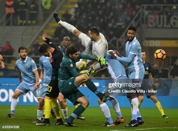 Samir Handanovic of FC Internazionale and Federico Marchetti of SS Lazio compete for the ball during the TIM Cup match between FC Internazionale and...