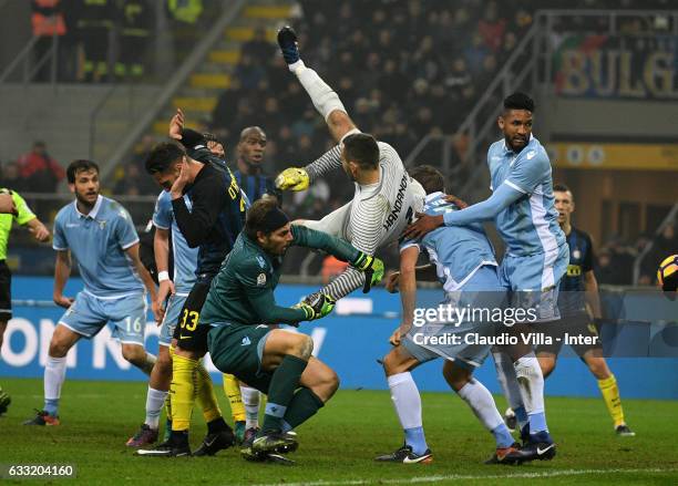 Samir Handanovic of FC Internazionale and Federico Marchetti of SS Lazio compete for the ball during the TIM Cup match between FC Internazionale and...