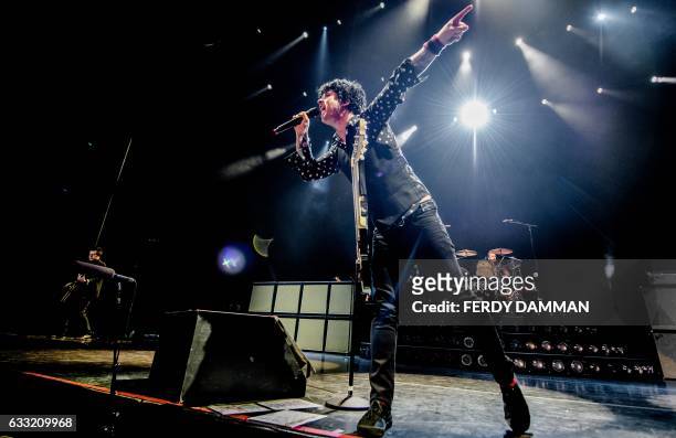 Musician Billie Joe Armstrong of punk rock band Green Day performs on stage at the Ziggo Dome in Amsterdam on January 31, 2017. / AFP / ANP / Ferdy...