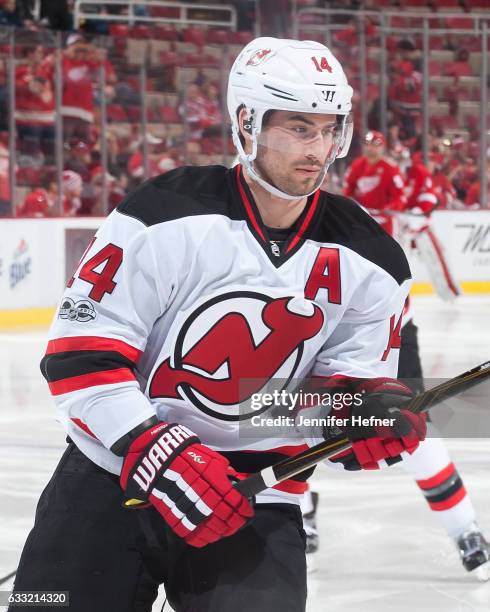 Adam Henrique of the New Jersey Devils skates in warm-ups prior to an NHL game against the Detroit Red Wings at Joe Louis Arena on January 31, 2017...