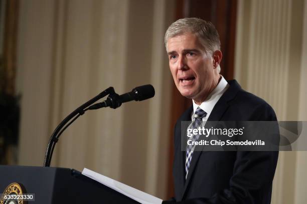 Judge Neil Gorsuch delivers brief remarks after being nominated by U.S. President Donald Trump to the Supreme Court with his wife Marie Louise...