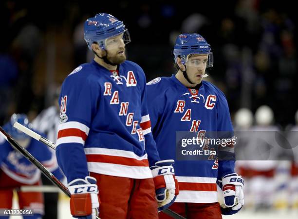 Rick Nash and Ryan McDonagh of the New York Rangers react to the loss to the Columbus Blue Jackets on January 31, 2016 at Madison Square Garden in...