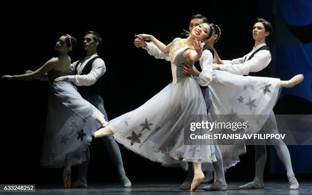 Picture taken on December 11, 2016 shows dancers performing at the opening of the Astana Ballet Theatre in the Kazakh capital of Astana. In the snowy...