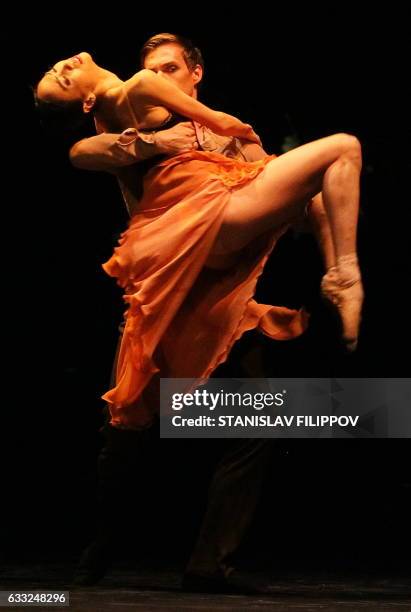 Picture taken on December 11, 2016 shows dancers performing at the opening of the Astana Ballet Theatre in the Kazakh capital of Astana. In the snowy...