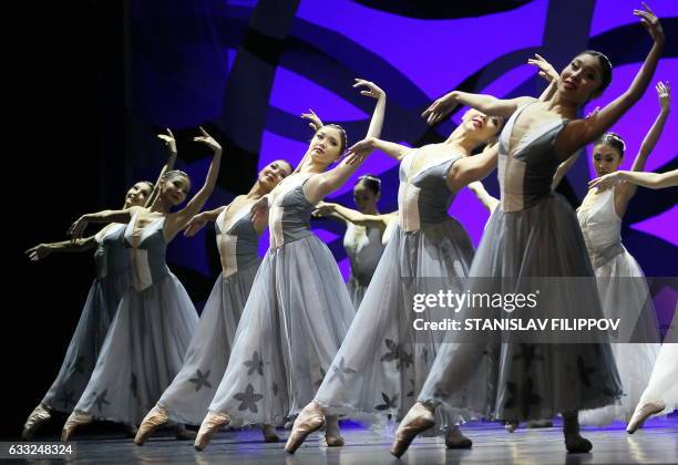 Picture taken on December 11, 2016 shows dancers performing at the opening of the Astana Ballet Theatre in the Kazakh capital of Astana. In the snowy...