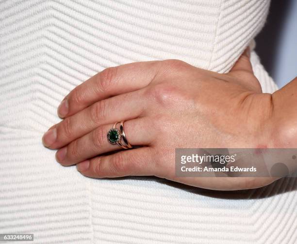 Actress Julianna Guill, ring detail, arrives at the Tyler Ellis 5th Anniversary party and launch of the Tyler Ellis x Petra Flannery Collection at...