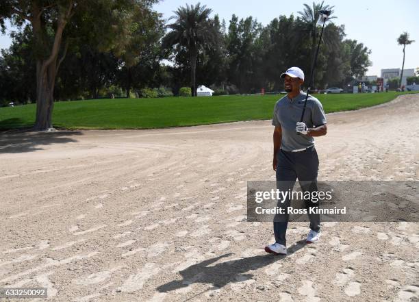 Tiger Woods of the USA walks off of the 18th tee during the pro-am event prior to the Omega Dubai Desert Classic at Emirates Golf Club on February 1,...