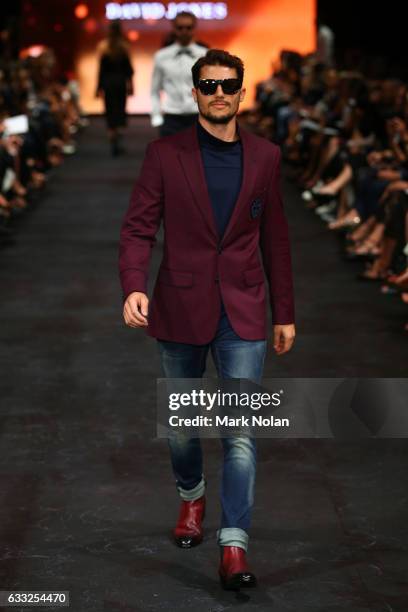 Jason Dundas showcases designs by Calibre on the runway at the David Jones Autumn Winter 2017 Collections Launch at St Mary's Cathedral Precinct on...