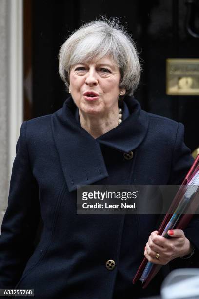 British Prime Minister Theresa May leaves for the weekly PMQ session in the House of Commons, at Downing Street on February 1, 2017 in London,...