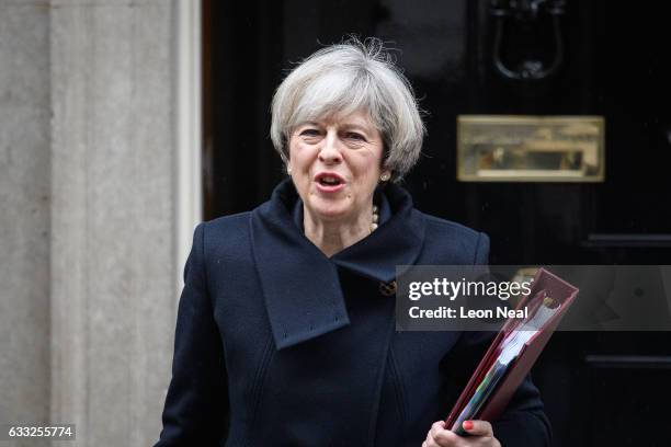 British Prime Minister Theresa May leaves for the weekly PMQ session in the House of Commons, at Downing Street on February 1, 2017 in London,...