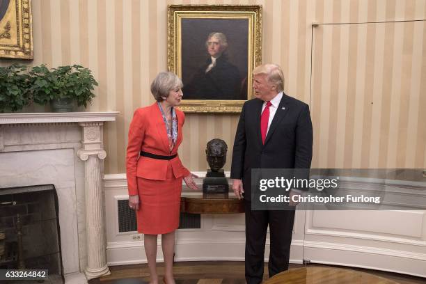 British Prime Minister Theresa May with U.S. President Donald Trump in The Oval Office at The White House on January 27, 2017 in Washington, DC....