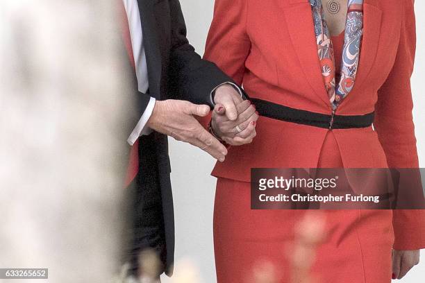 British Prime Minister Theresa May and U.S. President Donald Trump walk along The Colonnade of the West Wing at The White House on January 27, 2017...