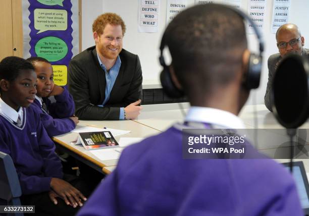 Prince Harry attends a lyrical writing class during a meeting with teachers and tutors during a visit to the Full Effect and Coach Core programmes at...