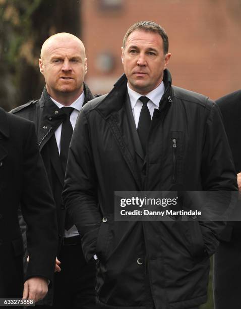 Ex Watford managers Sean Dyche and Malky Mackay attends the funeral of former England football manager Graham Taylor at St Mary's Church on February...