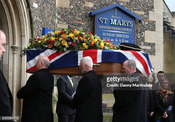 The coffin is carried into the church at the funeral of former England football manager Graham Taylor at St Mary's Church on February 1, 2017 in...