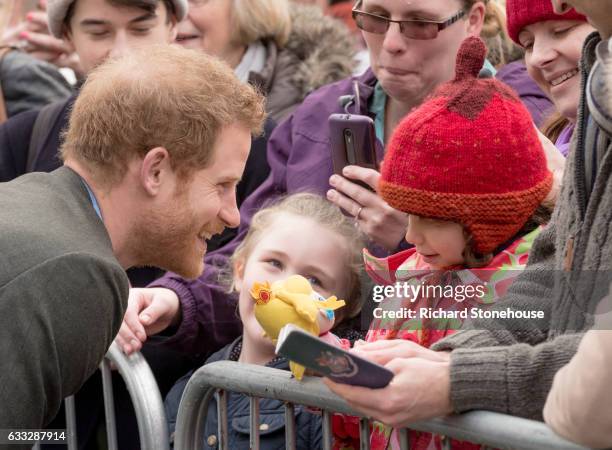 Prince Harry chats with children as he arrives for an official visit to Full Effect & Coach Core on February 1, 2017 in Nottingham, England. Full...